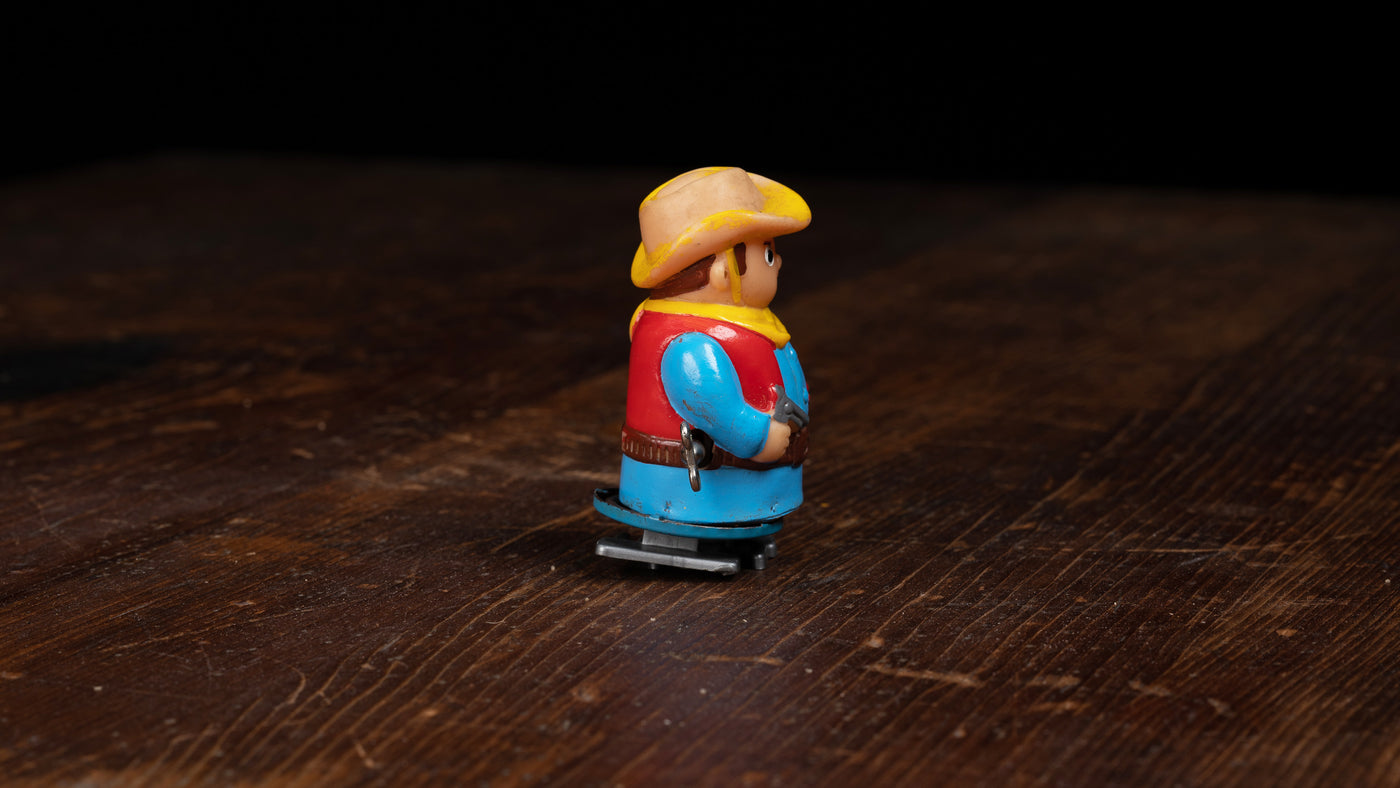 Vintage TOMY Wind-Up Cowboy Toy