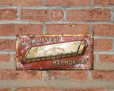 C. Early 1900s German Made Hohner Harmonica Embossed Tin Sign
