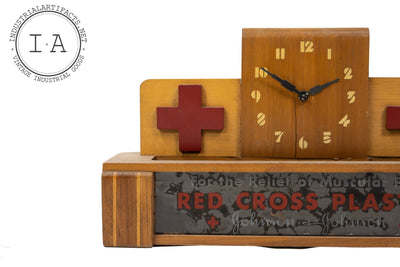 Early American Red Cross Reverse Painted Lighted Glass Clock