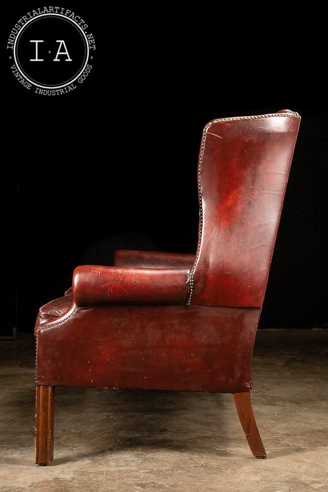 Vintage Tufted Leather Wingback Loveseat in Oxblood